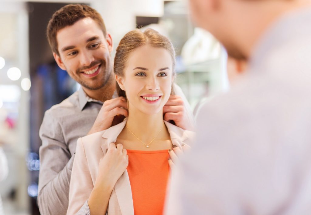 man and woman in jewelry store