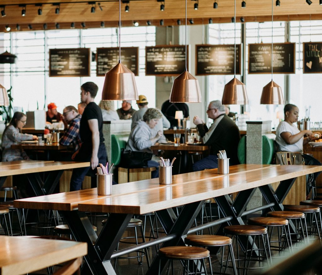Group of people eating inside a restaurant