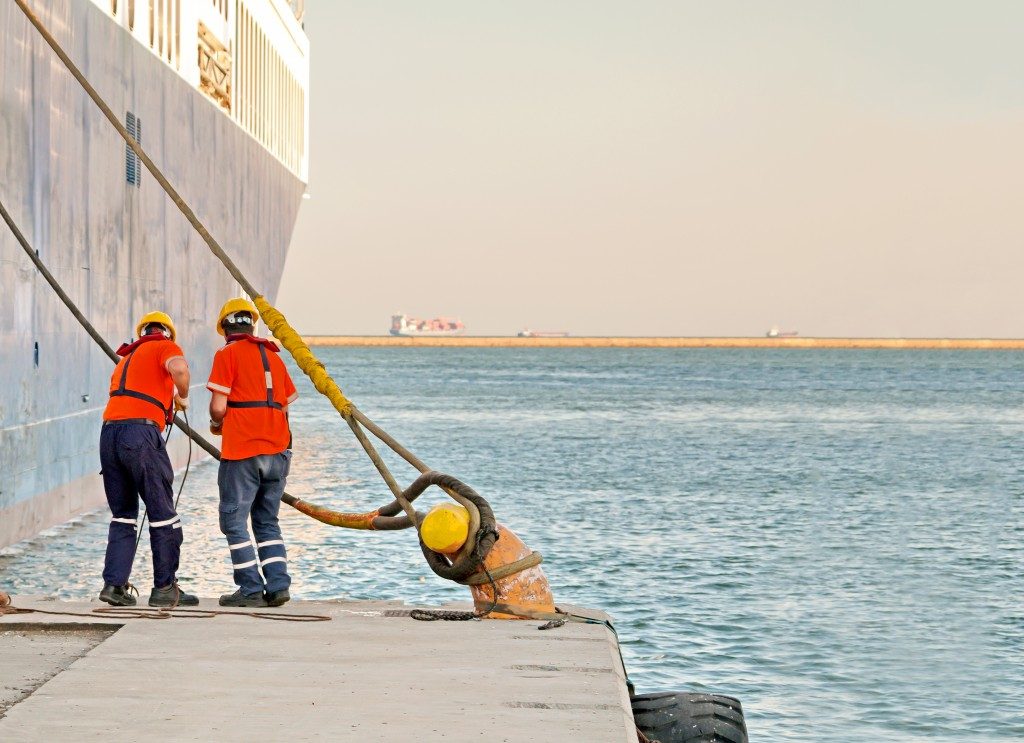 Mariners securing the ship is properly anchored