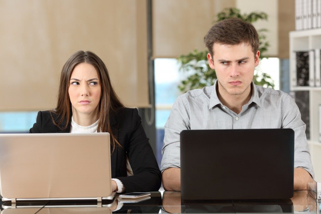 two employees angry with each other