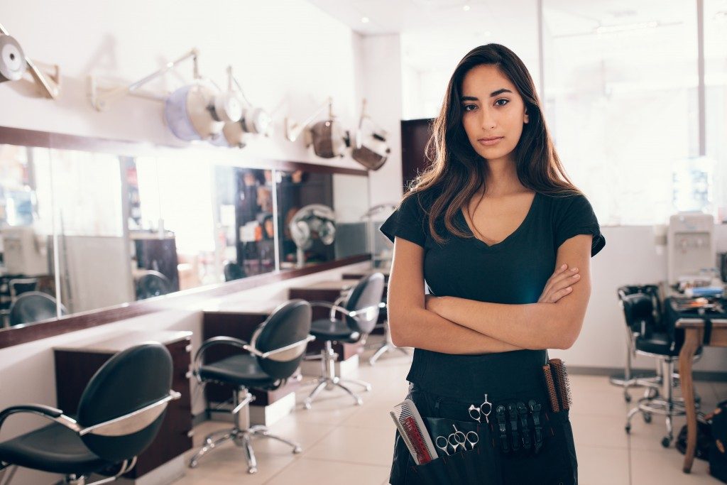 Woman running a hair salon business