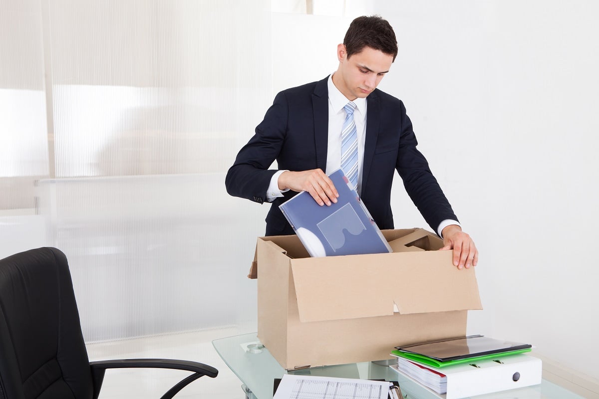 Resigning employee with box